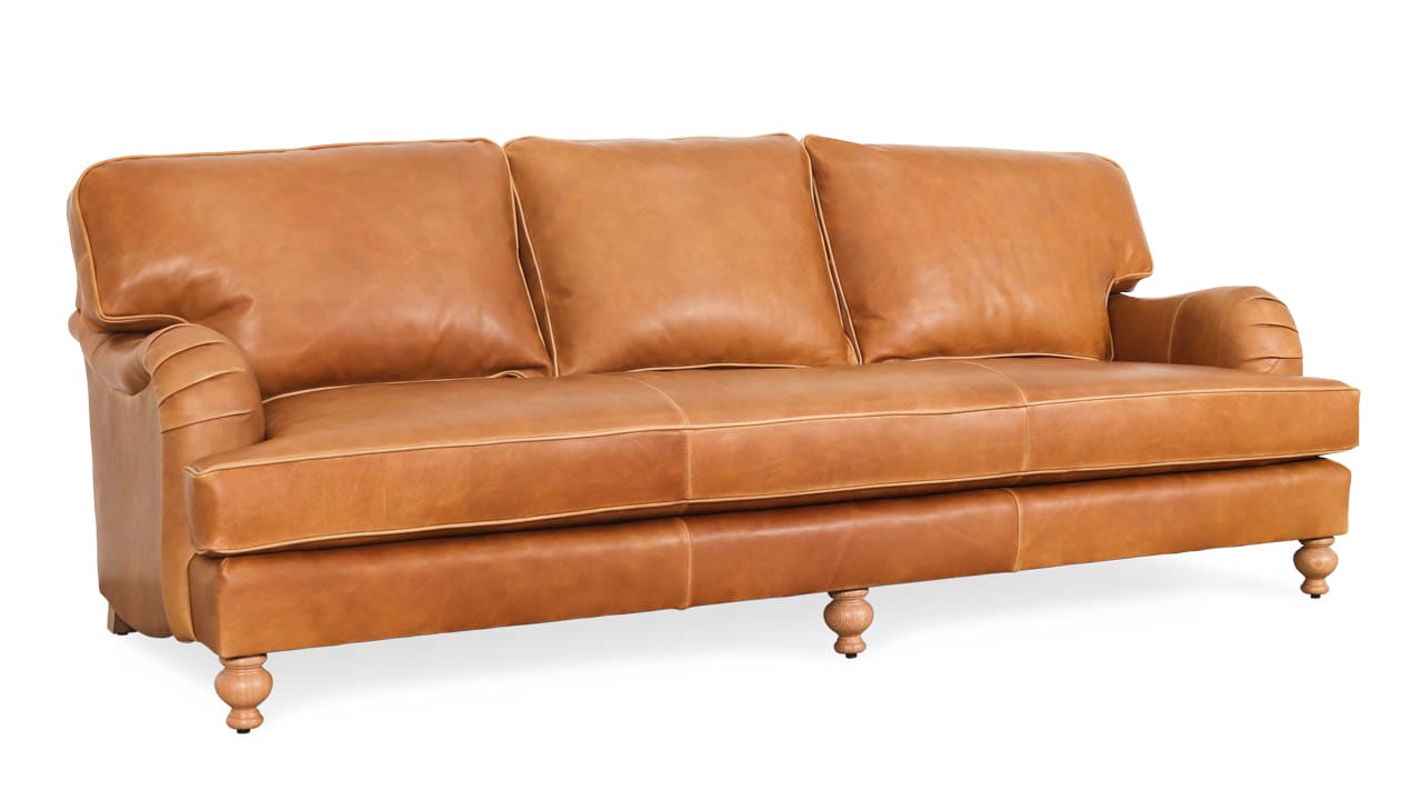 leather sofa with pillow arms